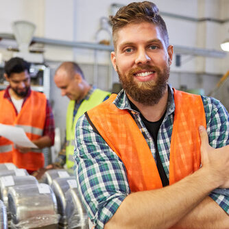 Happy,Warehouse,Worker,In,Training,In,Material,Warehouse,Of,Metal